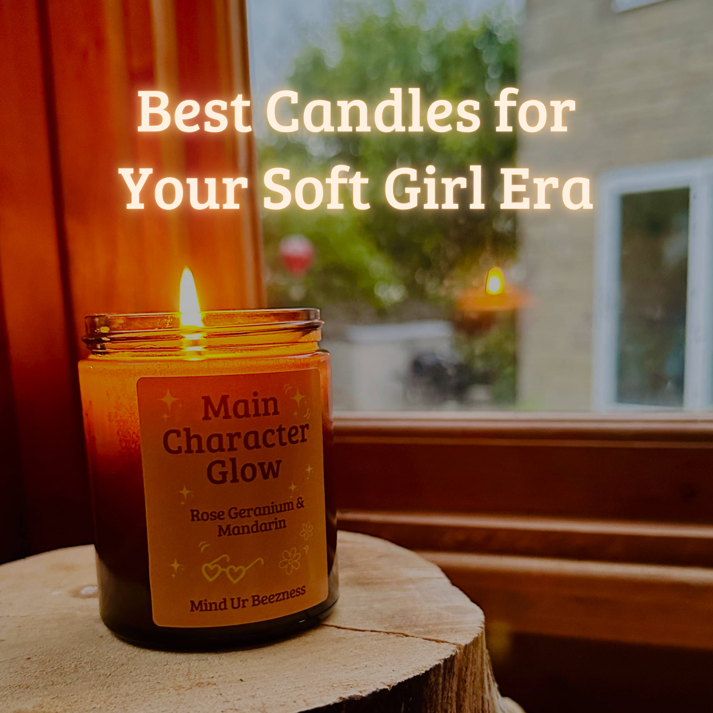 Main Character Glow candle by Mind Ur Beezness burning on a wooden surface beside a window, overlaid text reads “Best Candles for Your Soft Girl Era” — soft girl self-care aesthetic
